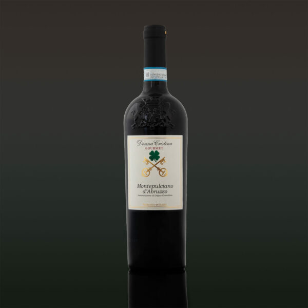 Montepulciano d'Abruzzo D.O.C. - 15 Bottles Ordering Unit The Montepuciano d'Abruzzo wine of controlled origin is the second best-selling Italian table wine in the world. To have the DOC appellation it must consist of at least 85% Montepulciano grapes and a maximum of 15% other Abruzzo grapes. We have decided to propose a wine in purity: 100% Montepulciano, trying not to alter the original taste of the grapes with a stay in wooden barrels. Light wine, with a deep purple color, almost gloomy despite being clear and bright, it offers hints of ripe fruit but also soft spices, without missing distant memories of coffee and bark. A famous legend, also told by the Greco-Roman historian Polybius states that the Carthaginian leader Hannibal (247 a.C. – 183 a.C.) made his army drink and heal wounds with this wine produced in "Abrazzo" and washed his horses with it to protect them from disease.  